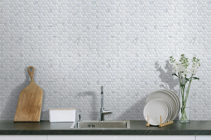 Satin glazed 12x10.5 inch Penny Round Porcelain Mosaic Tile in living room – elegant and contemporary wall mosaic design.