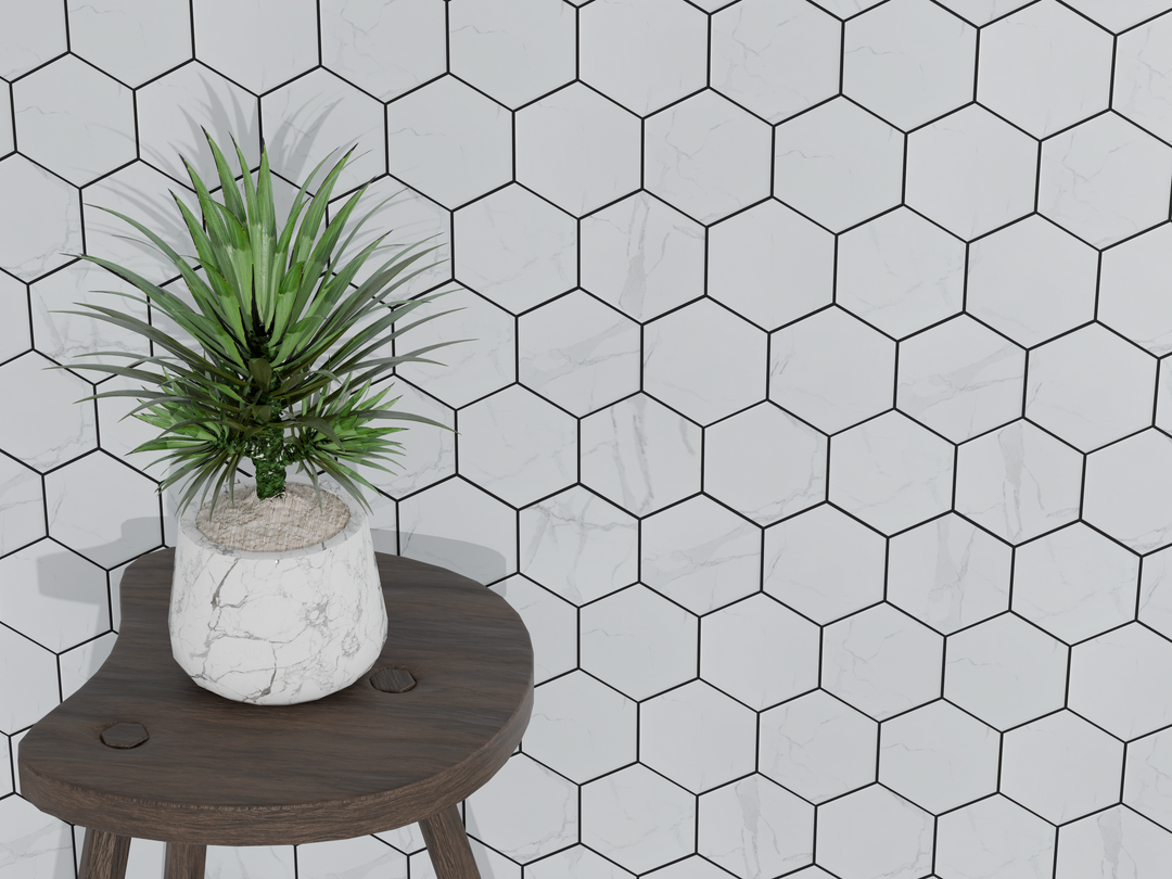 Living room accent wall with 4-in Hexagon Statuario Satin Porcelain Mosaic Tile – geometric satin finish porcelain design.