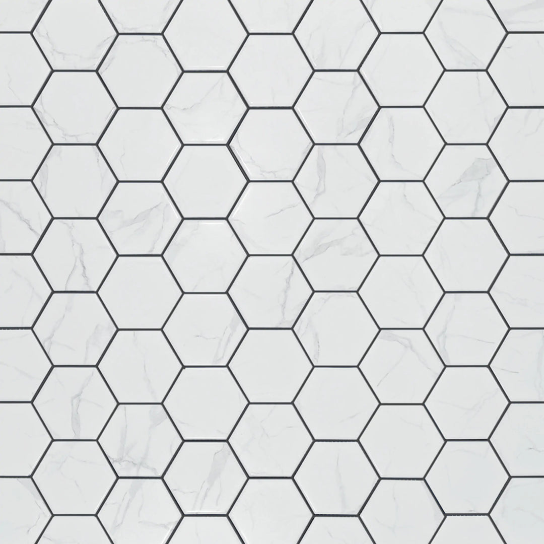 Display board of 4-in Hexagon Statuario Satin Porcelain Mosaic Tiles – satin glazed tiles arranged for showroom presentation.