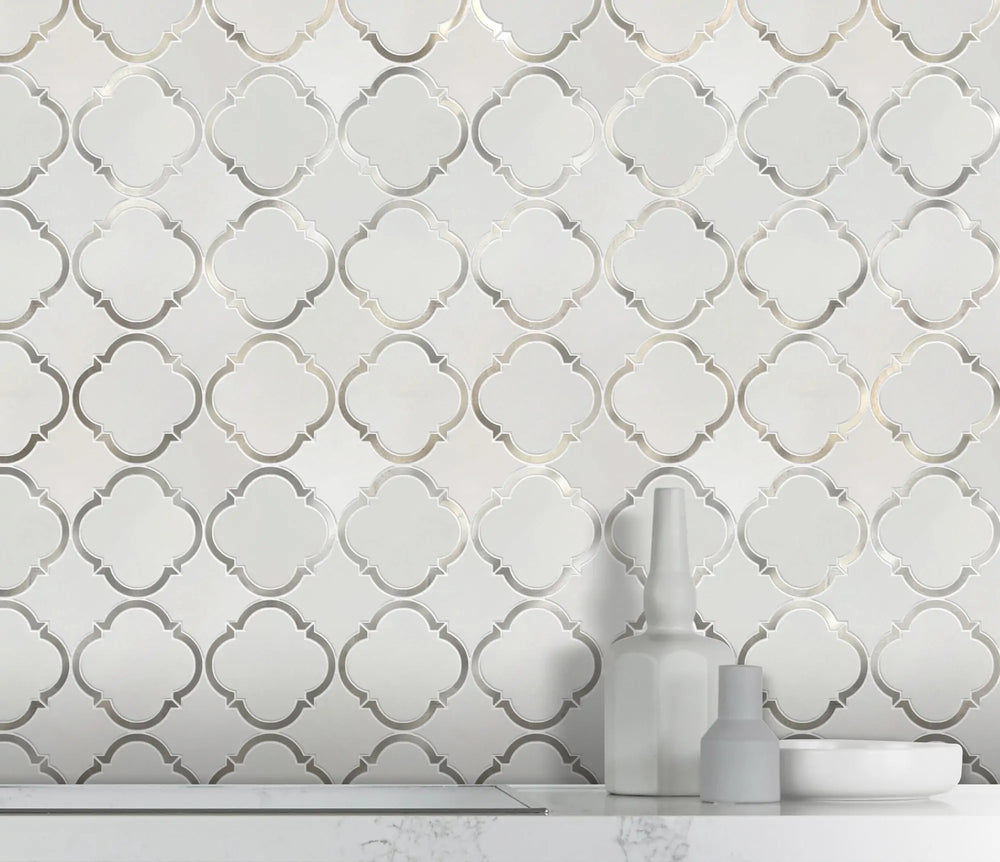Accent wall with 12.3x12.3 Thassos Marble and Metal Waterjet Mosaic – sophisticated design with polished marble and metal pattern trim