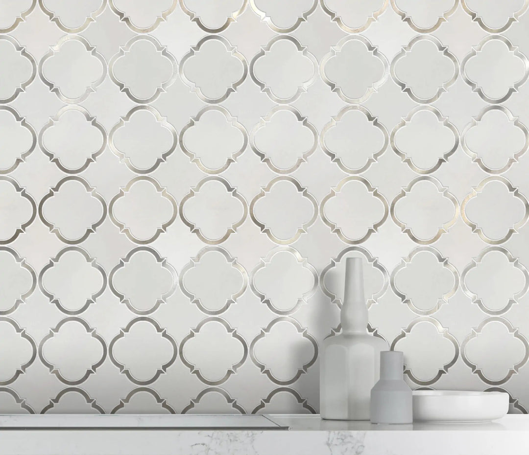 Accent wall with 12.3x12.3 Thassos Marble and Metal Waterjet Mosaic – sophisticated design with polished marble and metal pattern trim