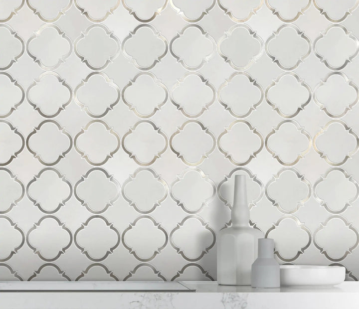 Accent wall with 12.3x12.3 Thassos Marble and Metal Waterjet Mosaic – sophisticated design with polished marble and metal pattern trim