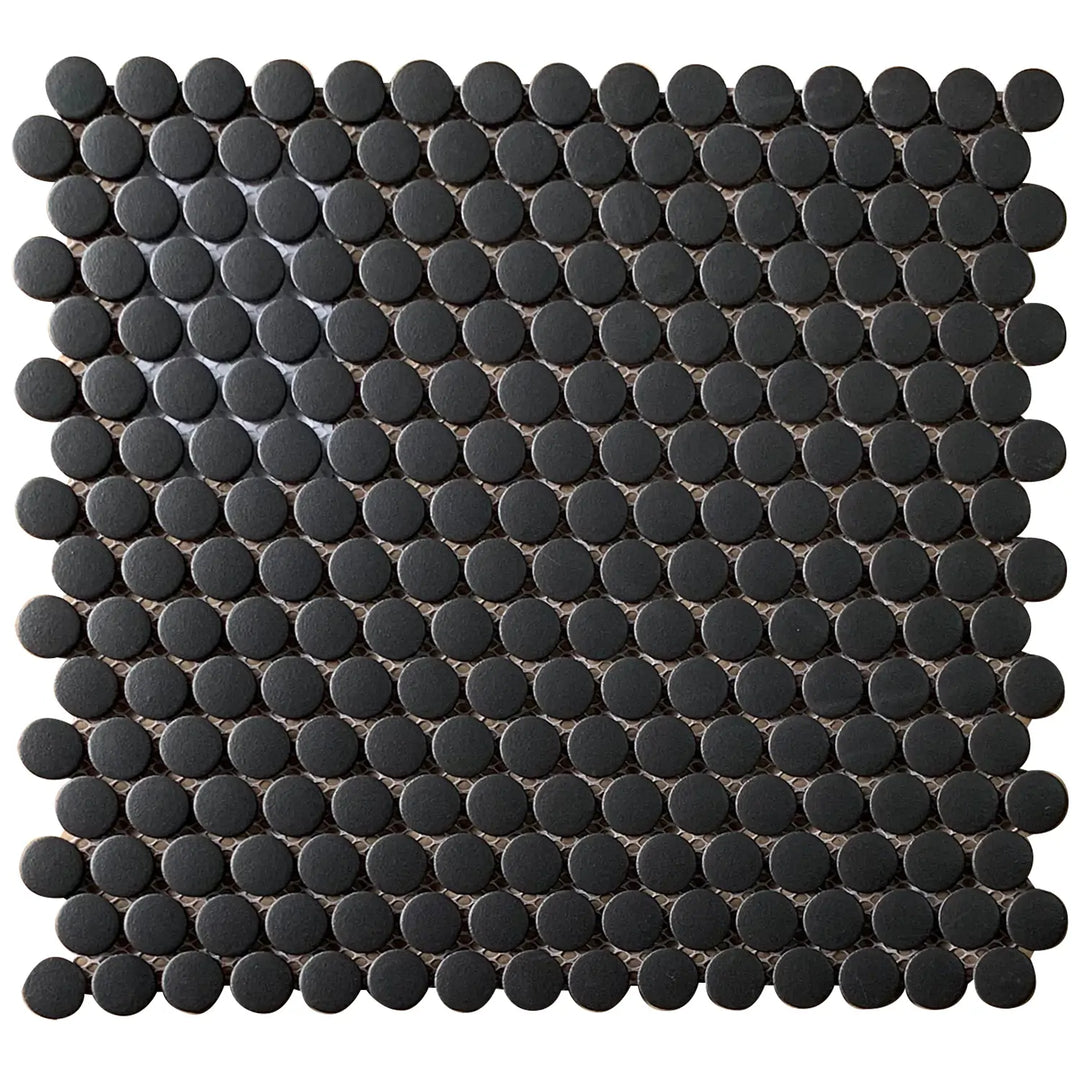 Matte glazed black penny round mosaic tile – 12.4-in x 11.5-in for wall and floor applications.