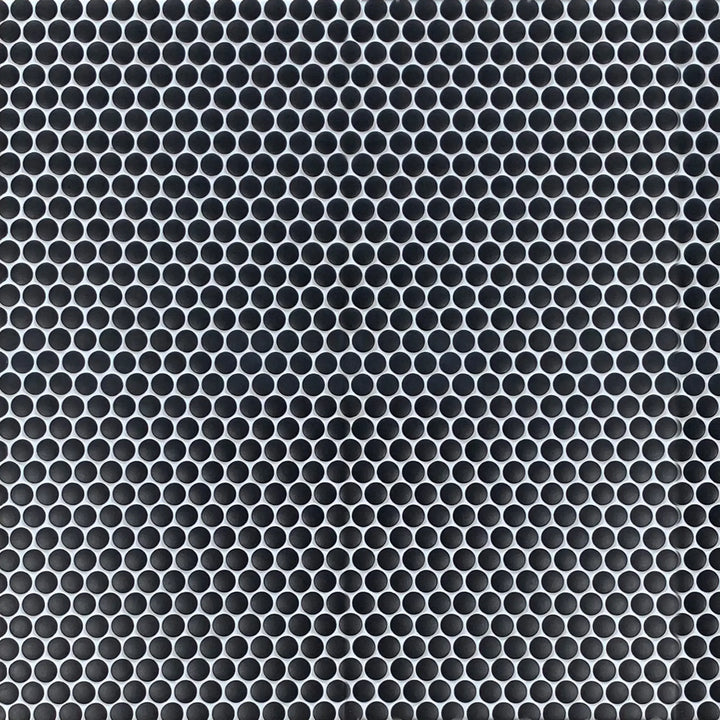 Sample board featuring Penny Round Black Porcelain Tile – matte finish 12.4-in x 11.5-in layout.