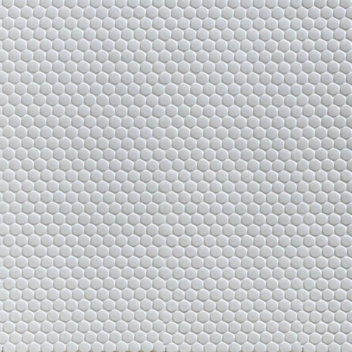 Sample display board of Penny Round White Porcelain Mosaic Tile – 12.4x11.5 inch matte sheet mounted for showroom presentation.