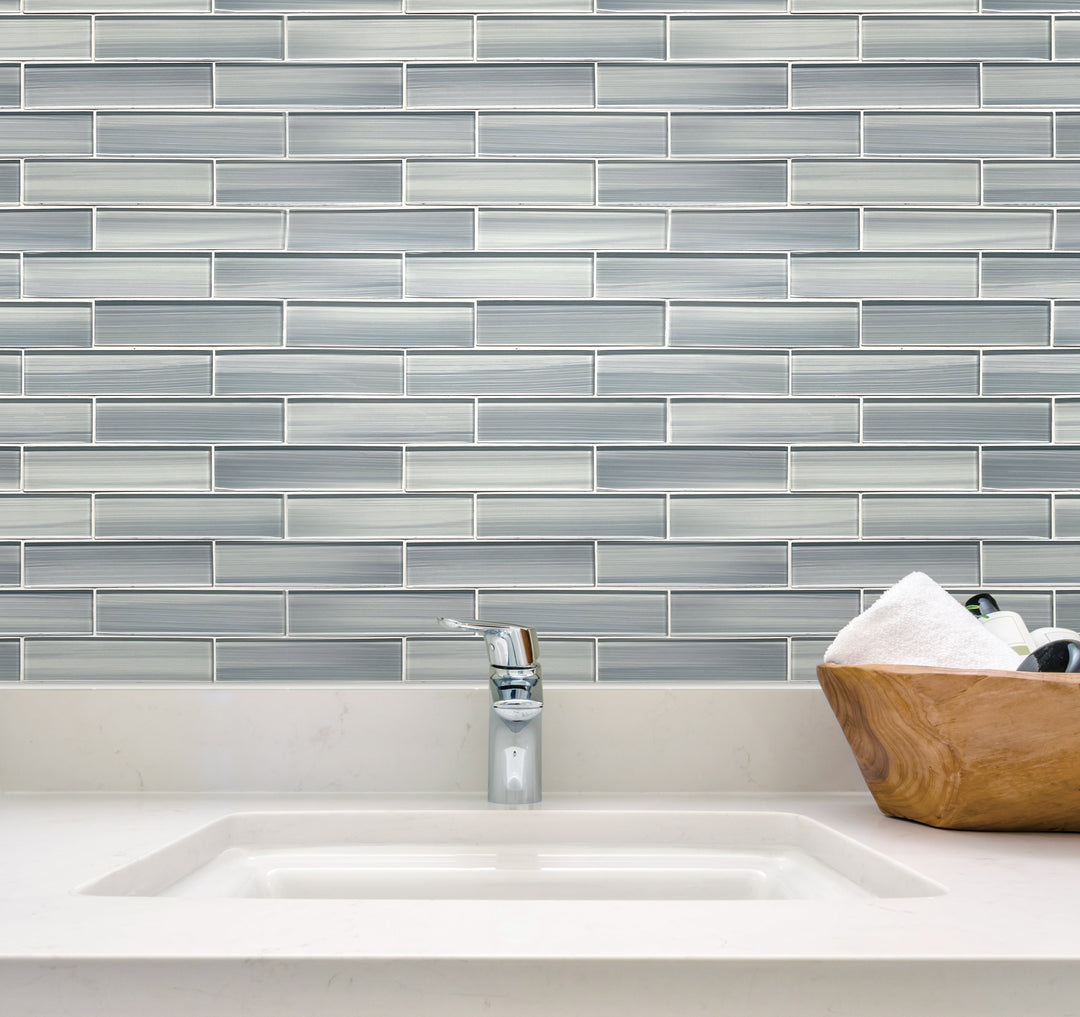 Accent wall featuring Blue Handpainted Subway Glass Mosaic Tiles – artistic 16x8 glass tiles in staggered layout