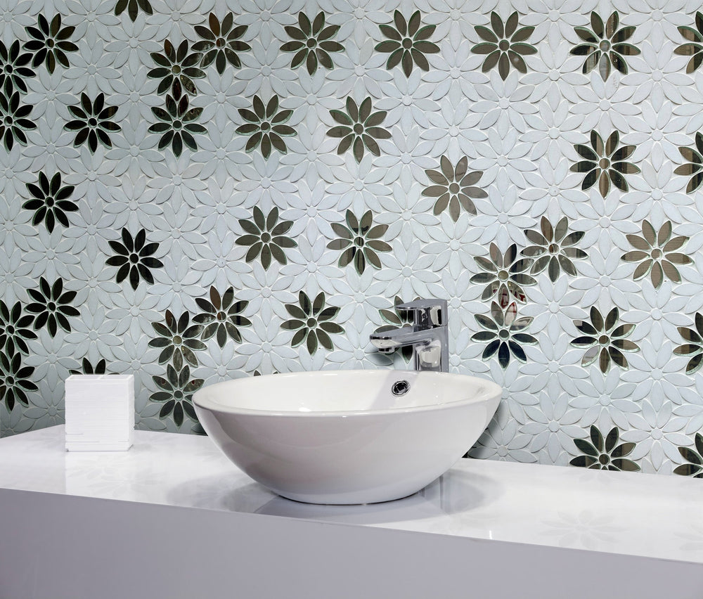 Bathroom wall decorated with Interlocking Floral Waterjet Mosaic Tile – reflective antique mirror accents combined with Thassos marble.