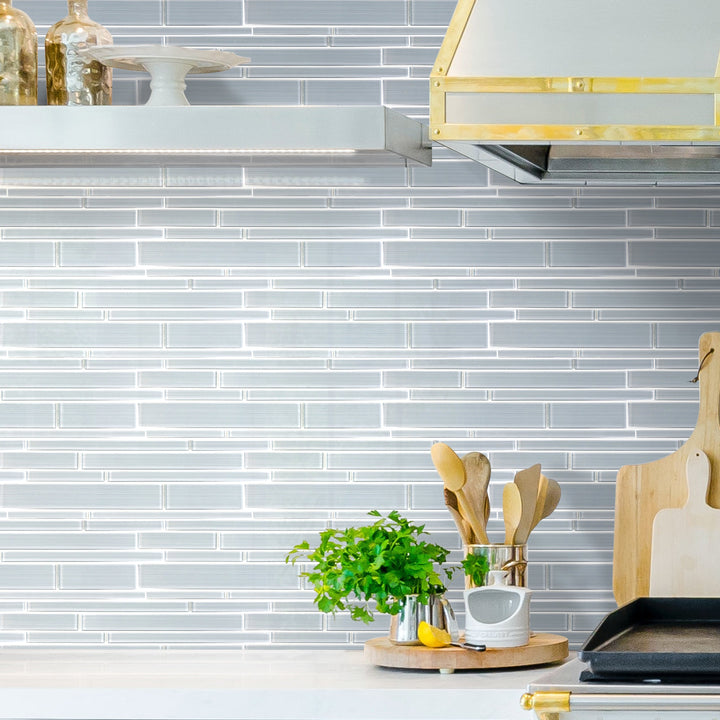 Modern kitchen backsplash with Ice Denim Glass Mix Random Strip Tiles – cool icy blue tones adding refreshing style.