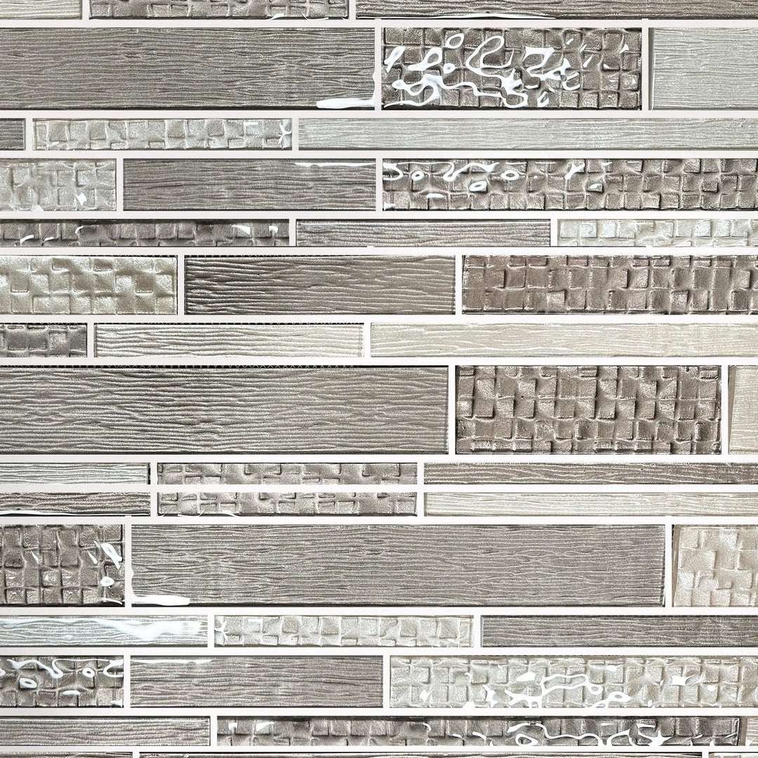Sample display board of 6x18 inch Mixed Neutrals Glass Mosaic Tile – showcasing random strip pattern and neutral glass tones
