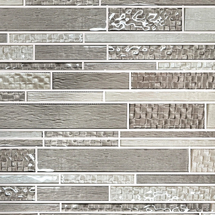 Sample display board of 6x18 inch Mixed Neutrals Glass Mosaic Tile – showcasing random strip pattern and neutral glass tones