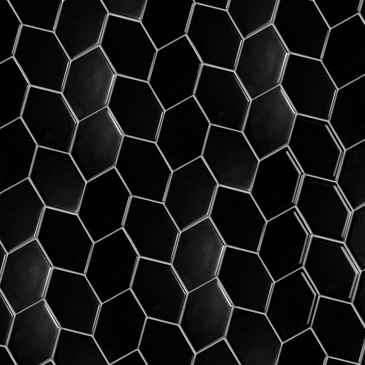 Display board of Black Leaf Pattern Hexagon Mosaic Tile – matte porcelain tiles arranged for showroom sample.