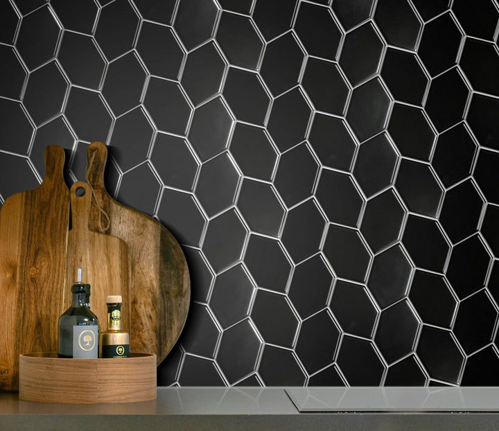 Kitchen backsplash featuring Black Interlocking Hexagon Leaf Mosaic Tile – matte black porcelain in modern cooking space.
