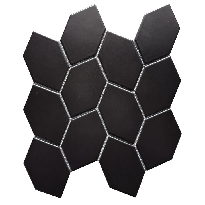 Single 12x11 inch Black Interlocking Hexagon Leaf Mosaic Tile – matte porcelain floor and wall tile sample.