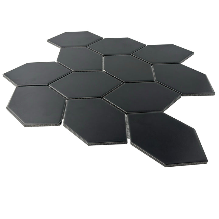 Flat front view of Black Interlocking Hexagon Leaf Mosaic Tile – full 12x11 inch matte porcelain layout.