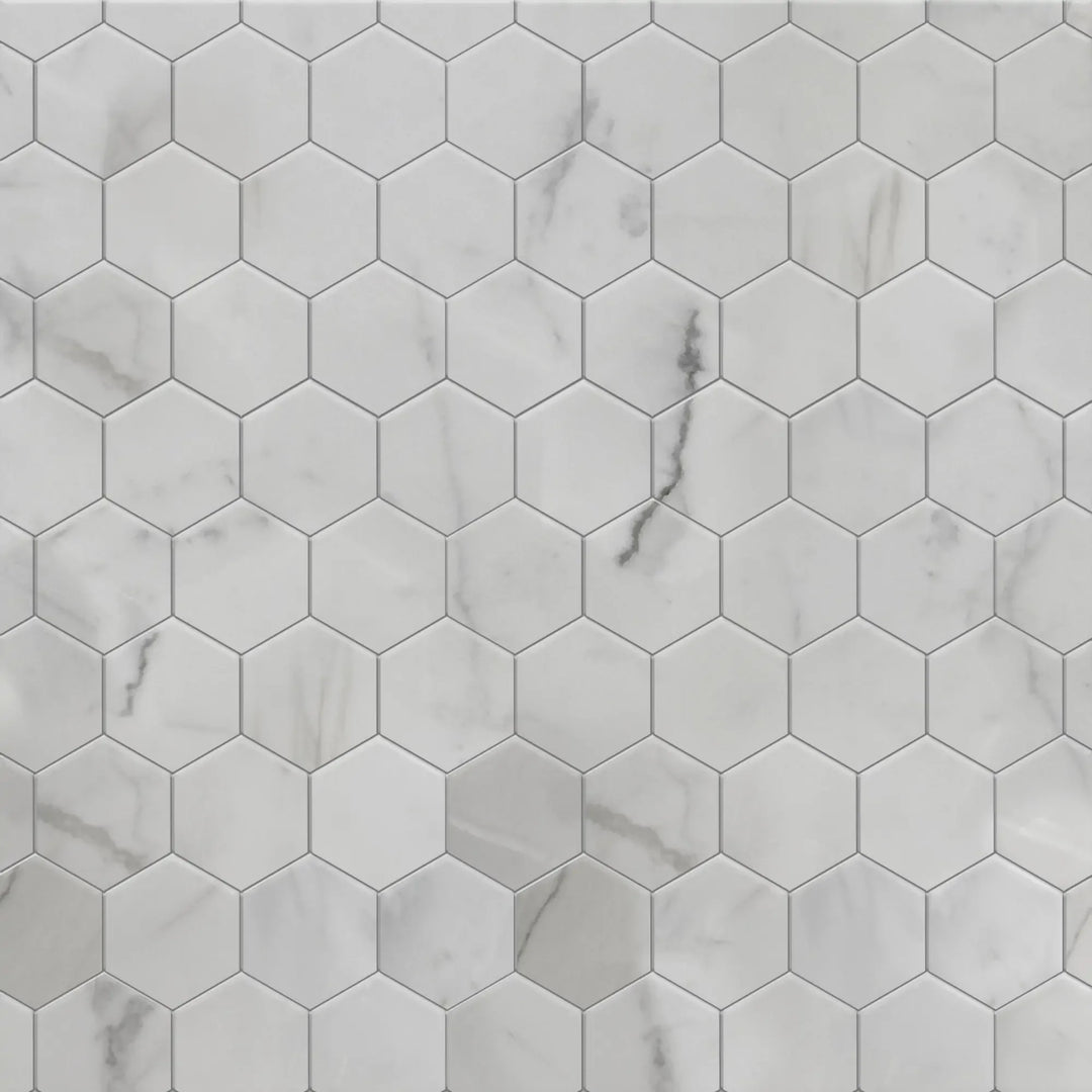 Sample display board of Calacatta Hexagon Honed Marble Mosaic – elegant natural stone for showroom or design pitch
