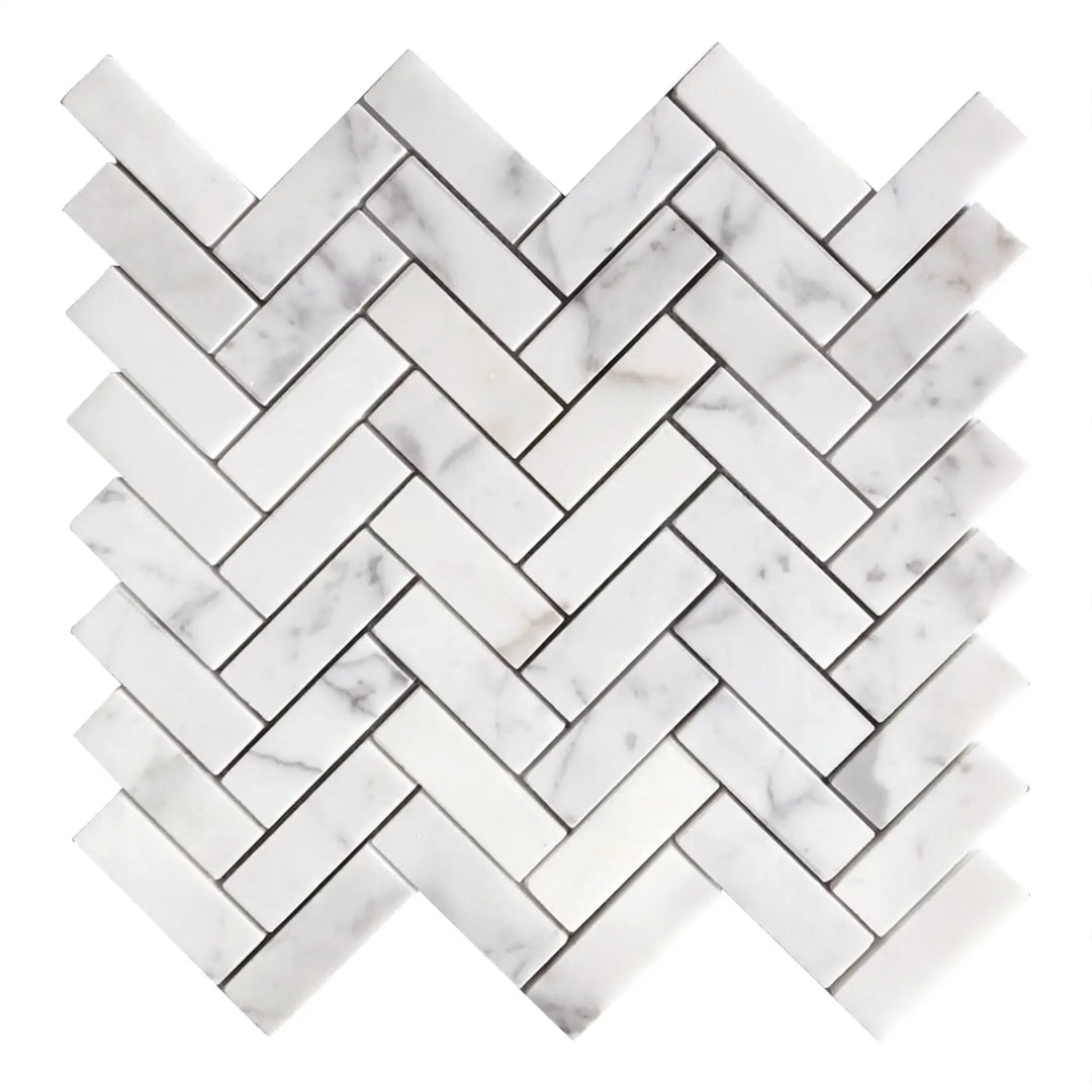 Single Calacatta Herringbone Mosaic Tile – 12x13 inch honed marble with classic herringbone pattern