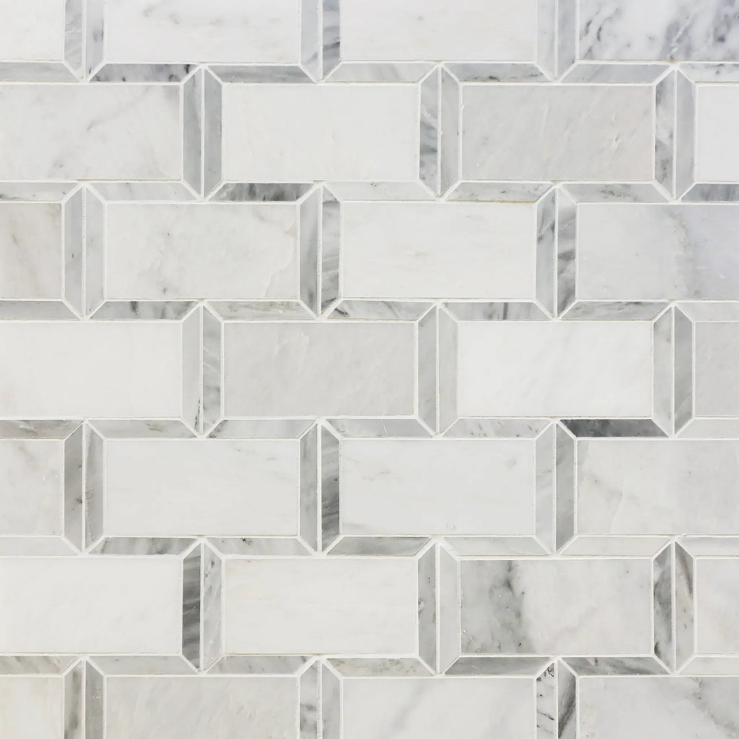 Sample board displaying Oriental White Subway Tile with Carrara Border – polished marble mosaic for showroom display
