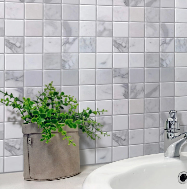 Bathroom wall with Calacatta Polished Marble Mosaic Tile – natural veining creates spa-like atmosphere