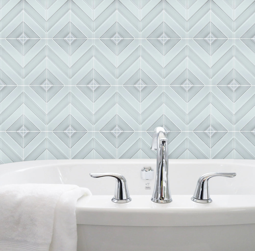 Bathroom wall featuring 12x12 inch Diamond Chevron Glass Mosaic Tiles with Metallic Edge – chic chevron pattern with metallic finish for a modern bathroom