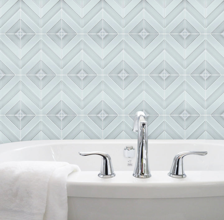 Bathroom wall featuring 12x12 inch Diamond Chevron Glass Mosaic Tiles with Metallic Edge – chic chevron pattern with metallic finish for a modern bathroom