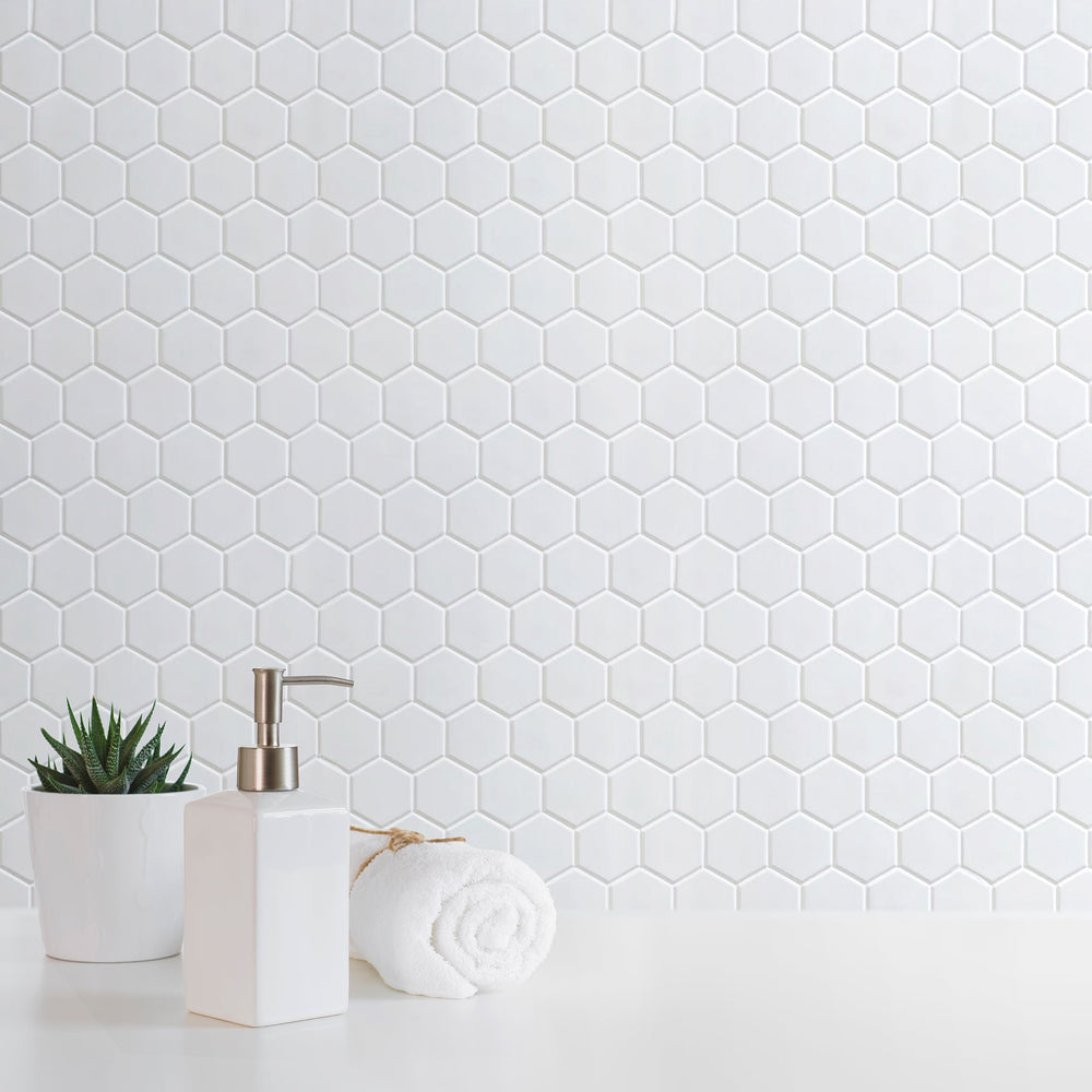 Bathroom wall featuring White 2-inch Hexagon Porcelain Mosaic Tile – matte white hex tiles create a fresh, clean look.