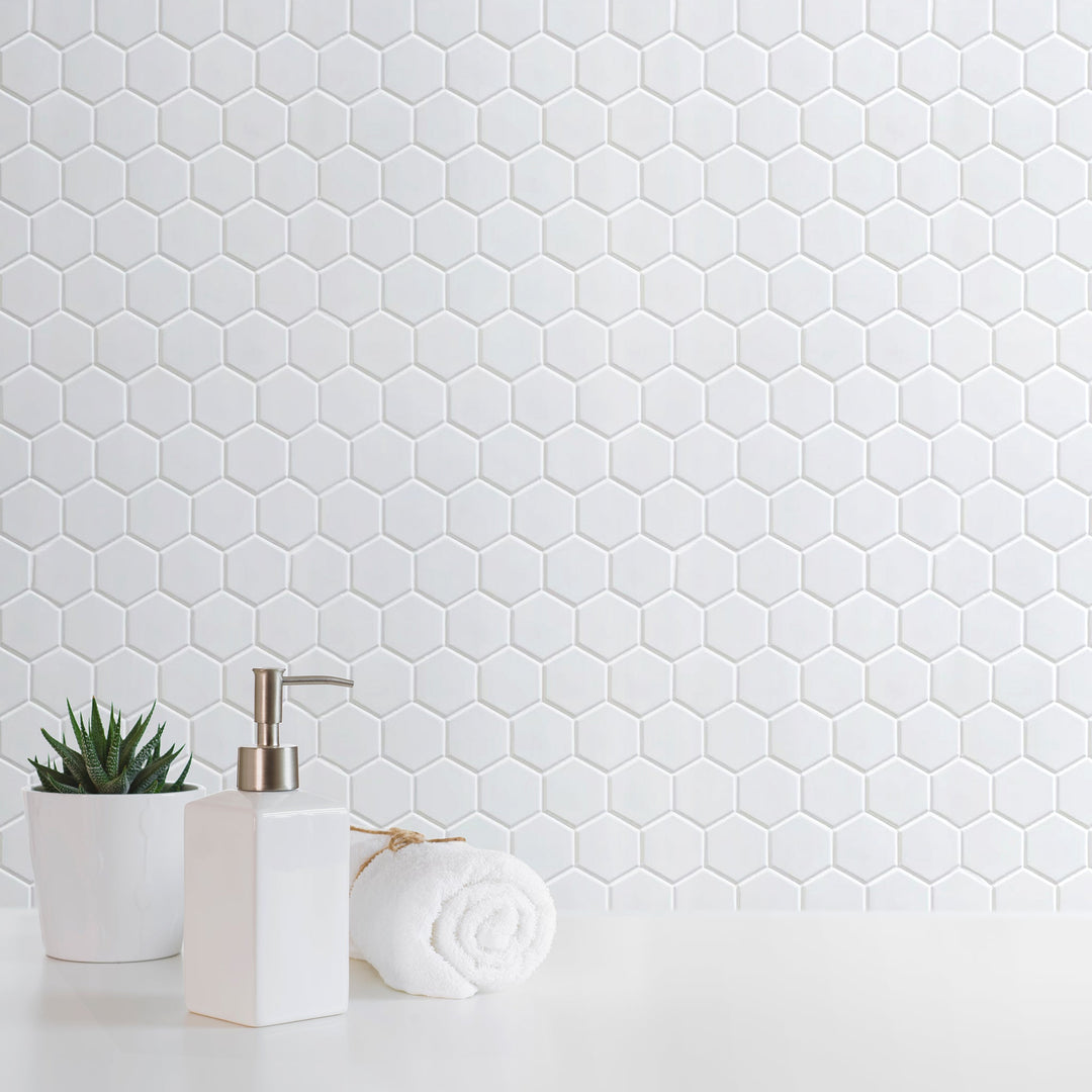 Bathroom wall featuring White 2-inch Hexagon Porcelain Mosaic Tile – matte white hex tiles create a fresh, clean look.