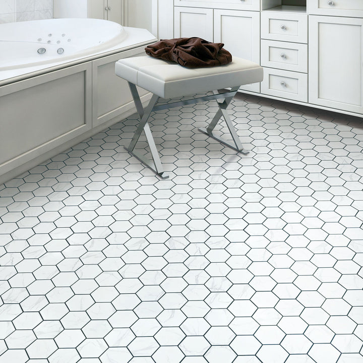 Contemporary bathroom featuring satin glazed Statuario Hexagon Mosaic Tiles – white porcelain wall and floor tile.