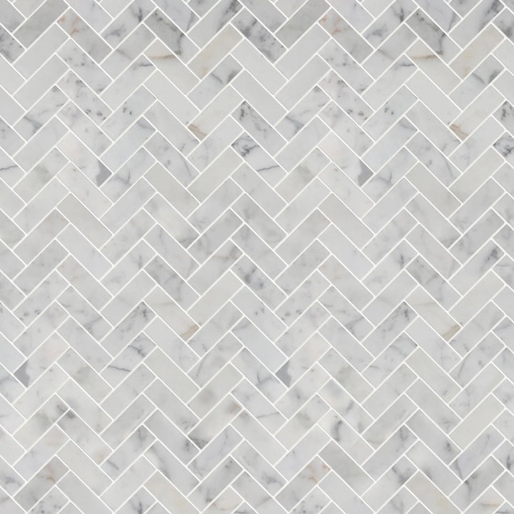 Sample display board of Calacatta Herringbone Honed Marble Mosaic Tile – elegant tile layout for showroom